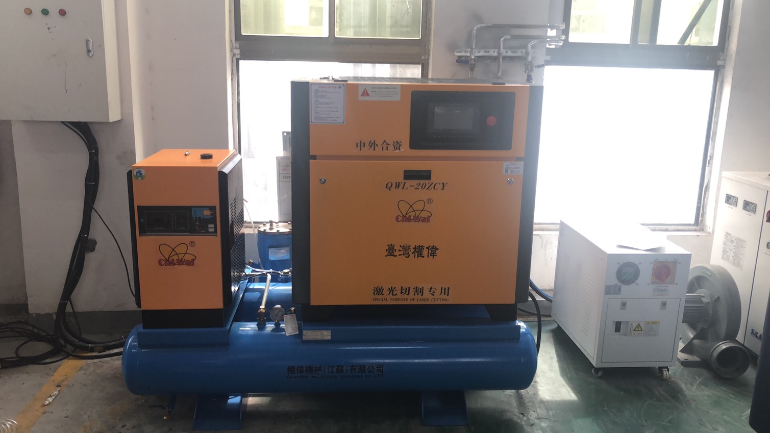 蘇州太易檢測(cè)設(shè)備有限公司選用權(quán)偉激光切割螺桿空壓機(jī)